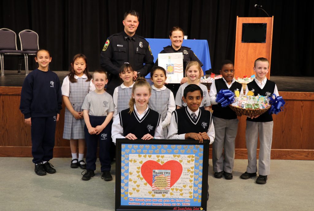 All Saints Catholic School honors the Manassas City Police Department.